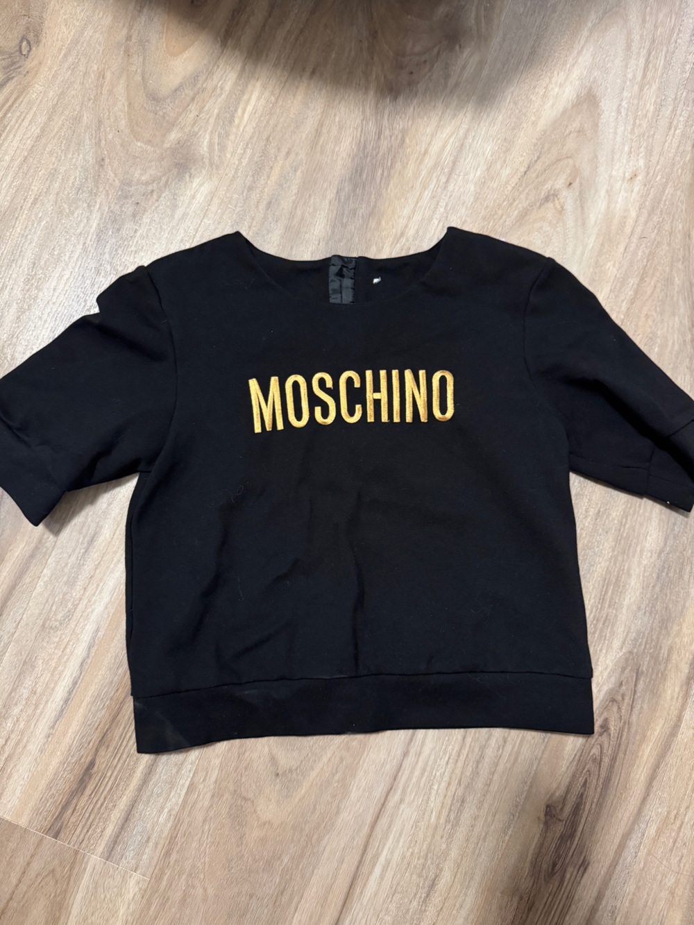 Moschino Black Cropped Sweatshirt with Gold Logo